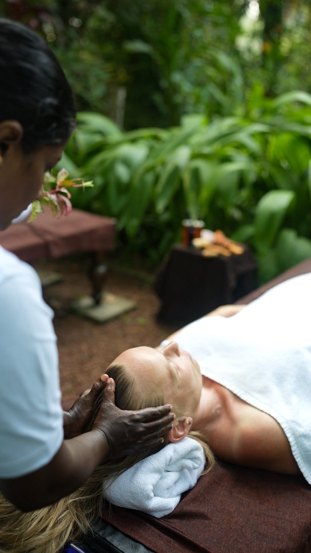 Outdoor Ayurvedic massage in garden